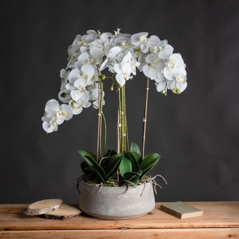 large artificial orchid in pot