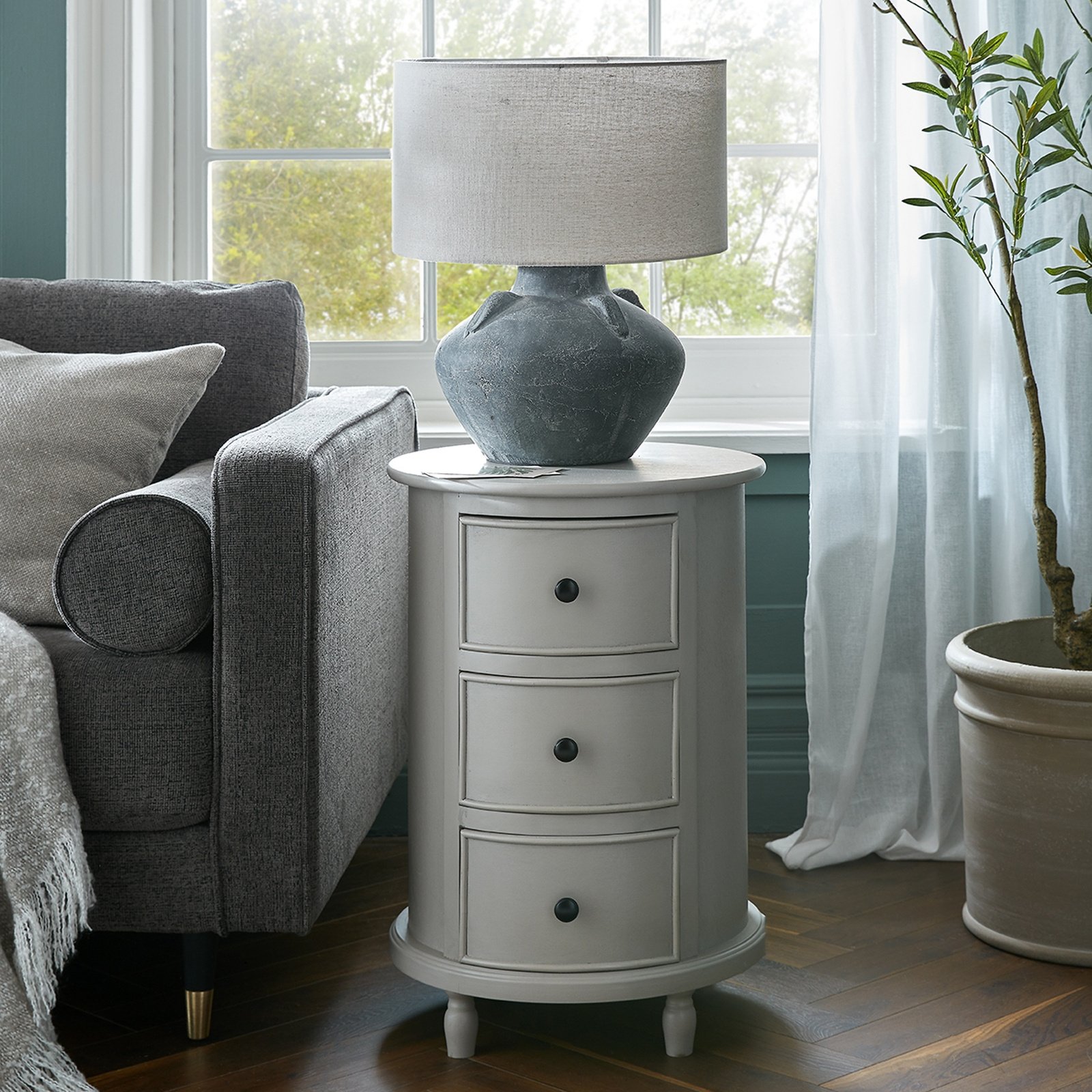 round side table with drawers