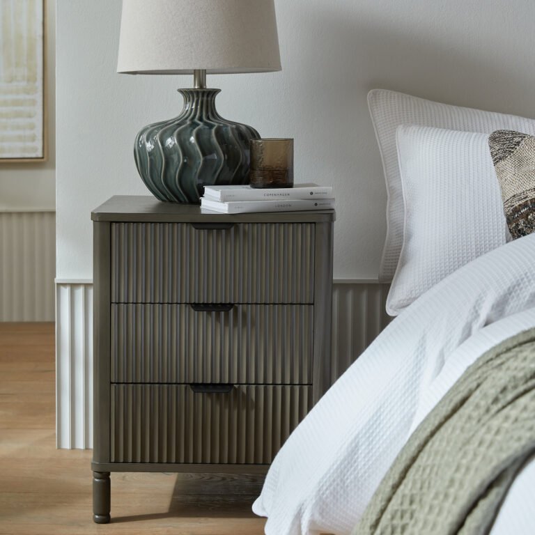 reeded three drawer bedside table for home styling
