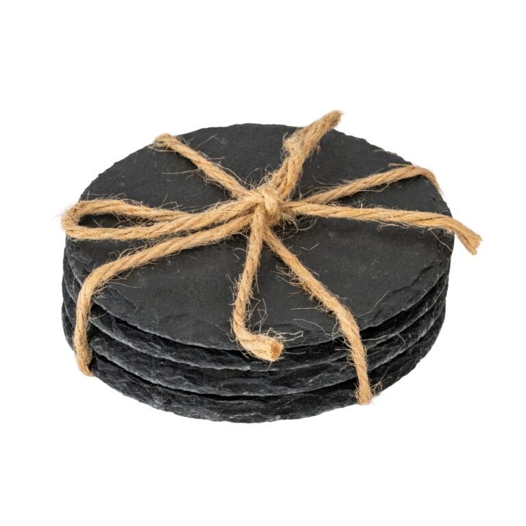 four round natural slate coasters styled home accessory